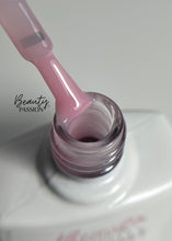 Charger l'image dans la galerie, Flacon de Top Coat Milky Pink 10ml Beauty Passion, finition rose laiteux délicat pour une manucure nude et soignée.